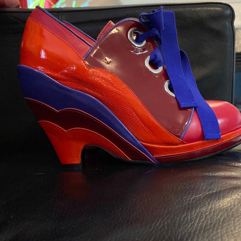 Wedge heel ribbon lace up shoe.